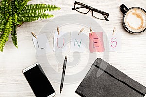 Lunes sign and a coffe on a desk photo