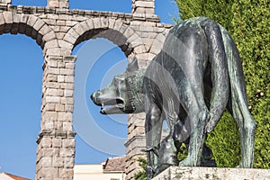 Lupa Capitolina statue at the foot of Aqueduct of Segovia photo