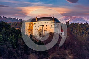 Lupca castle surrounded by trees and mountains in Slovakia