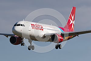 Luqa, Malta 9 January 2015: Air Malta Airbus A320-211 on short finals runway 31.