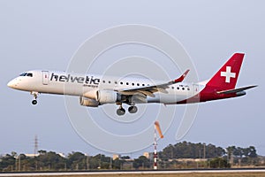 Luqa, Malta 10 July 2015: Helvetic ERJ-190 landing.