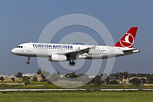 Luqa, Malta 25 March 2015: Turkish Airlines Airbus A320-232 on finals runway 31.