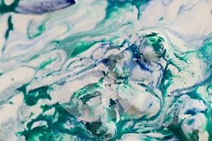 Luqiud vivid blue and green color mixing together on white background. Painting, splash marble abstract texture