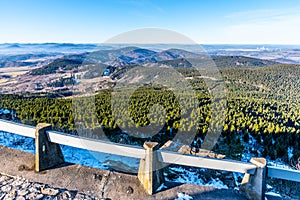 Lusatian Mountains, Czech: Luzicke hory, panoramic view of hilly landscape from Jested Mountain on sunny freezy day