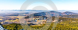 Lusatian Mountains, Czech: Luzicke hory, panoramic view of hilly landscape from Jested Mountain on sunny freezy day