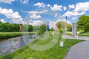 Lusatian Neisse with flags of Czech Republic, Germany, Europe Union and Poland in Sudetes on border of three countries