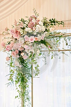 Lush floral arrangement of white and pink fresh flowers