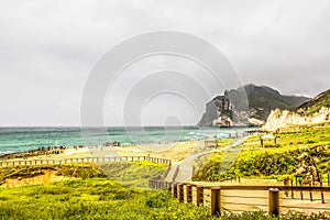 Lush green landscape and Seascape, Al Mughsayl Rocky Beach, Salalah, Oman