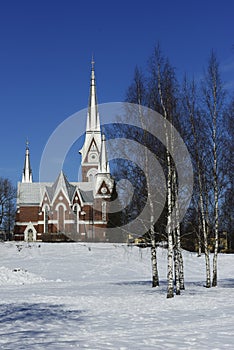 Lutheran Church of neo-Gothic architecture in winter, Joensuu, F photo