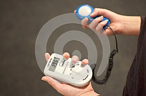 Lux meter for measuring light intensity in hand