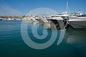 Luxe yachts in the port of Antibes photo