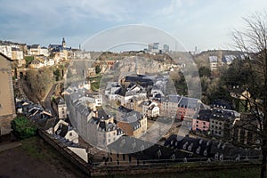 Luxembourg city skyline - Aerial view of The Grund at night with St Michaels Church on background - Luxembourg City, Luxembourg