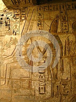 Luxor: carvings of pharaoh and wife, Medinet Habu