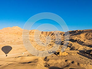 Luxor, Egypt- March 20 2023: Hot air balloon in the sky, over the Valley of the Kings