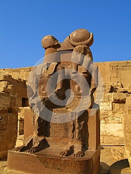 Luxor: granite statues at Medinet Habu temple photo