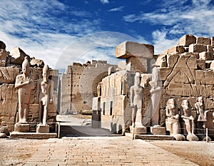 Luxor Karnak Temple, ancient Egyptian pharaoh sculptures.