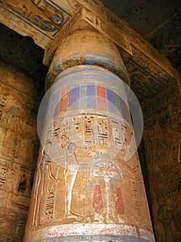 Luxor: Polychromed column at Medinet Habu temple photo