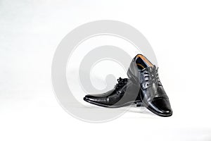 Luxuary man leather black shoe on the white isolation backtground