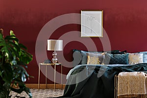 Luxurious bedroom interior with poster