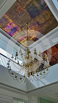 A Luxurious Chandelier on a High Ceiling