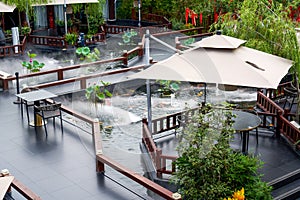 Luxurious Chinese garden restaurant seats and ancient building turret