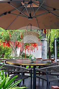 Luxurious Chinese garden restaurant seats and ancient building turret