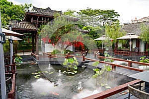 Luxurious Chinese garden restaurant seats and ancient building turret