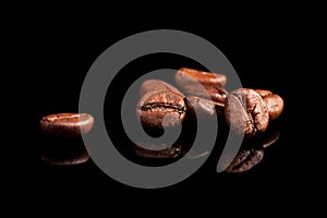 Luxurious coffee beans on black.