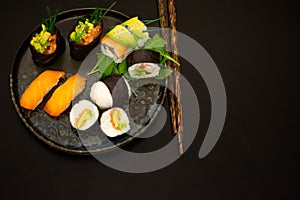 Luxurious and creative Sushi as Nigiri,Futomaki,Uramaki with chopsticks and Soja