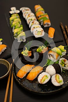 Luxurious and creative Sushi as Nigiri,Futomaki,Uramaki with chopsticks and Soja