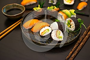 Luxurious and creative Sushi as Nigiri,Futomaki,Uramaki with chopsticks and Soja