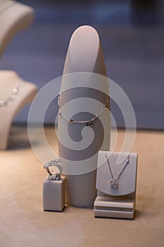 Luxurious diamond accessories displayed on a window of a jewelry store