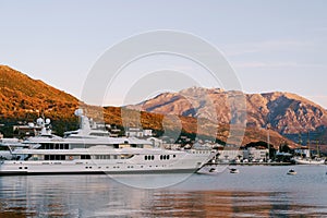 Luxurious double-deck superyacht docked in Porto. Montenegro
