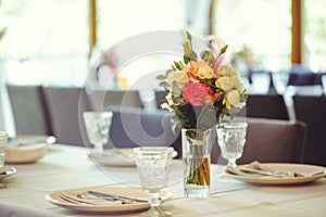 Luxurious floral arrangement of pink and white flowers fixed on the wall