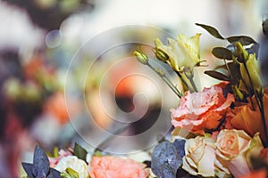 Luxurious floral arrangement of pink and white flowers fixed on the wall