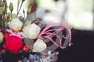 Luxurious floral arrangement of pink and white flowers fixed on the wall