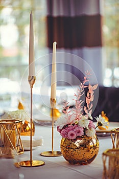 Luxurious floral arrangement of pink and white flowers fixed on the wall