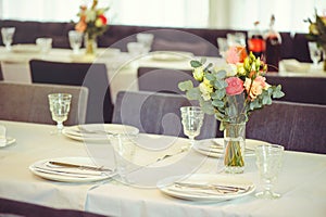 Luxurious floral arrangement of pink and white flowers fixed on the wall