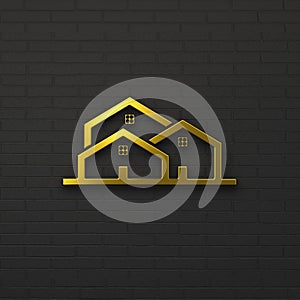 Luxurious golden houses real estate logo on a black brick background