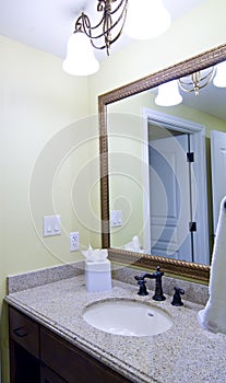 Luxurious hotel bathroom vanity and mirror photo