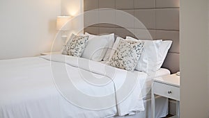 Luxurious hotel suite with king sized bed and cozy ambiance