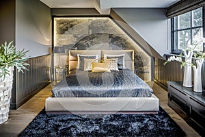 Luxurious master bedroom in black, blue and grey