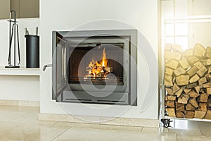 Luxurious modern design fireplace with glass door, white walls on yellow marble floor home interior