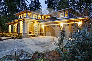 Luxurious new construction home exterior at sunset