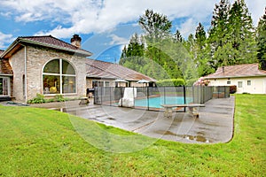 Luxurious northwest home with large pool and patio area.