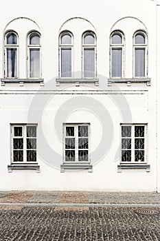 Luxurious old apartament house with a white facade