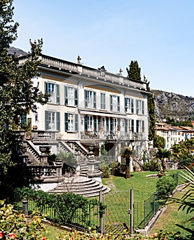 Luxurious old mansion with stone stairs and a beautiful garden. Como, Italy
