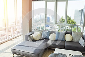 Luxurious penthouse real estate with modern trendy design and view of the ocean and city.