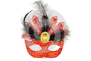 Luxurious red masquerade mask with feathers