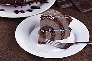 Luxurious Rich Chocolate Cake on White Plate